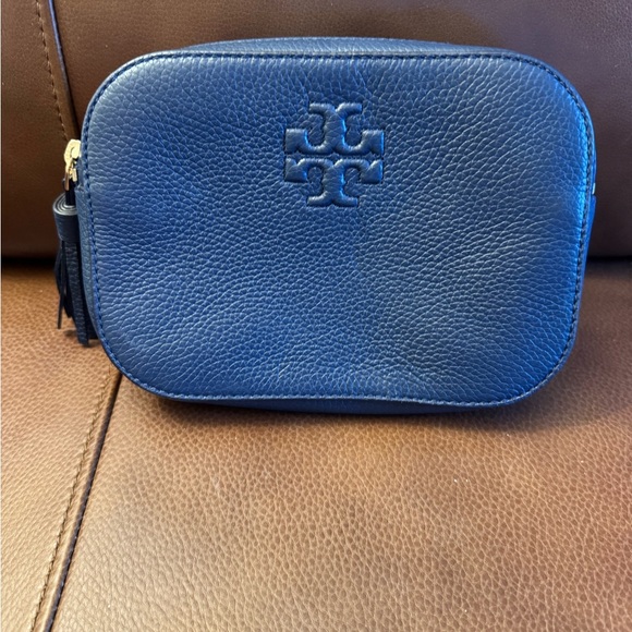 Tory Burch Handbags - Tory Burch, navy blue pebbled leather belt bag with tassel accent